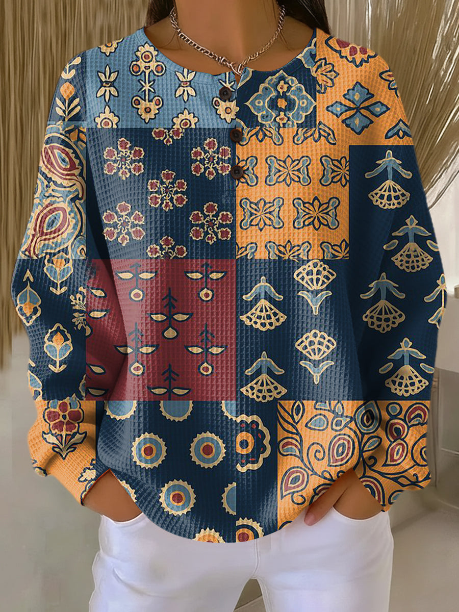 アニカ | エスニック風チェック柄の花柄プリントセーター