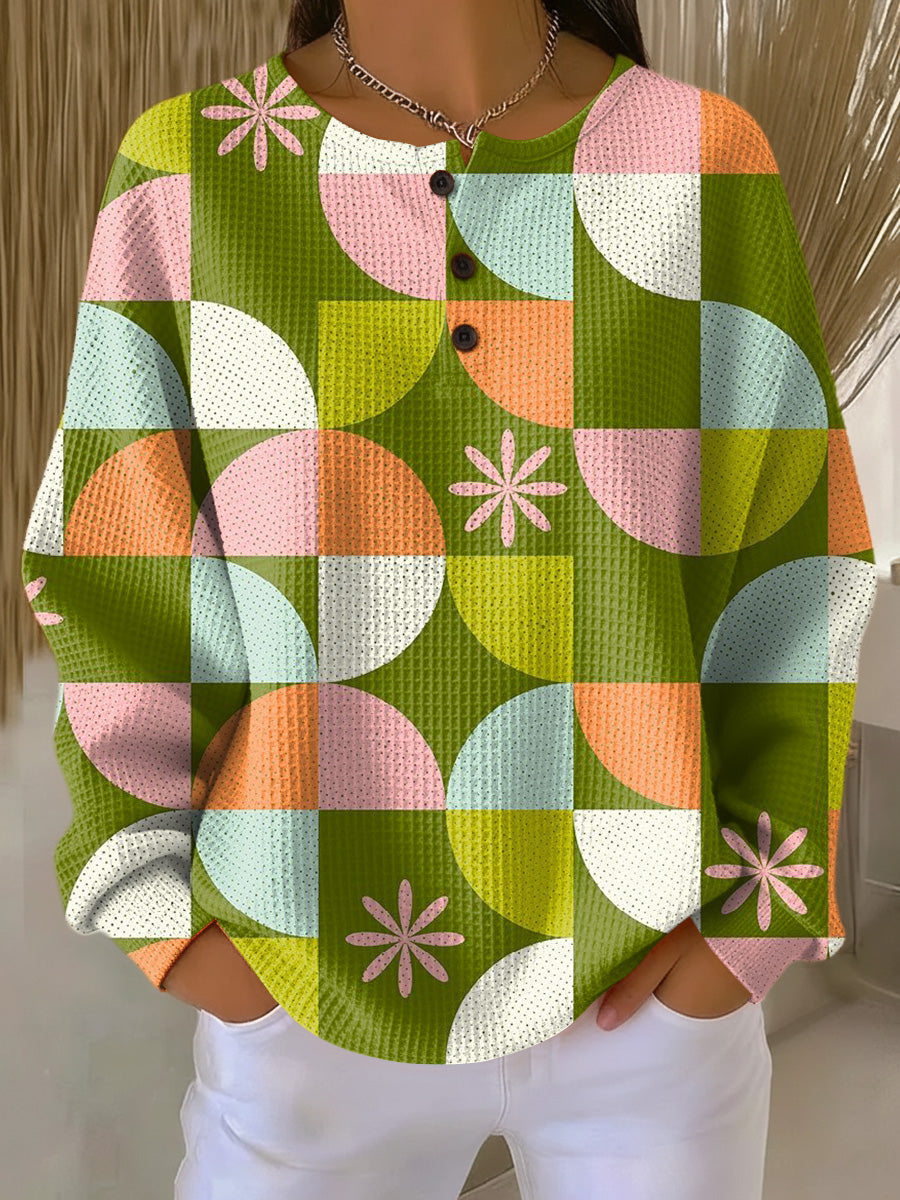 サガ | 抽象的なチェック柄セーター